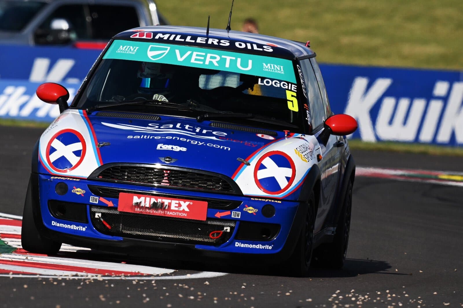 Katia Loggie racing for EXCELR8 Motorsport at Donington Park race course in the Mini Challenge JCW